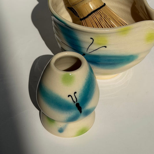 whimsical butterfly whisk stand