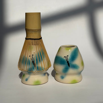 whimsical butterfly whisk stand