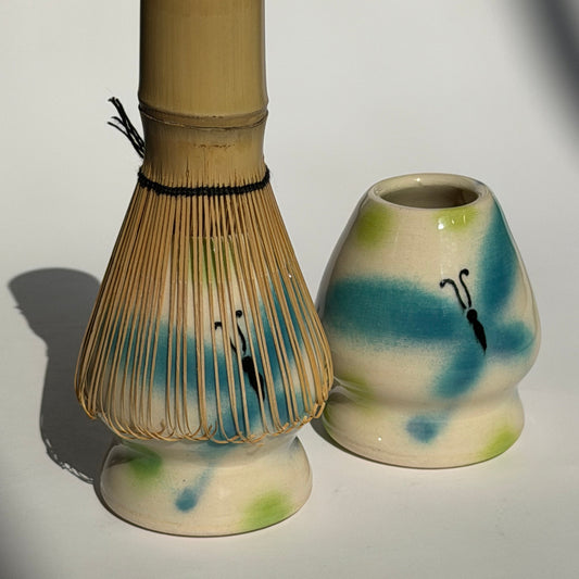 whimsical butterfly whisk stand