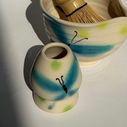 whimsical butterfly whisk stand
