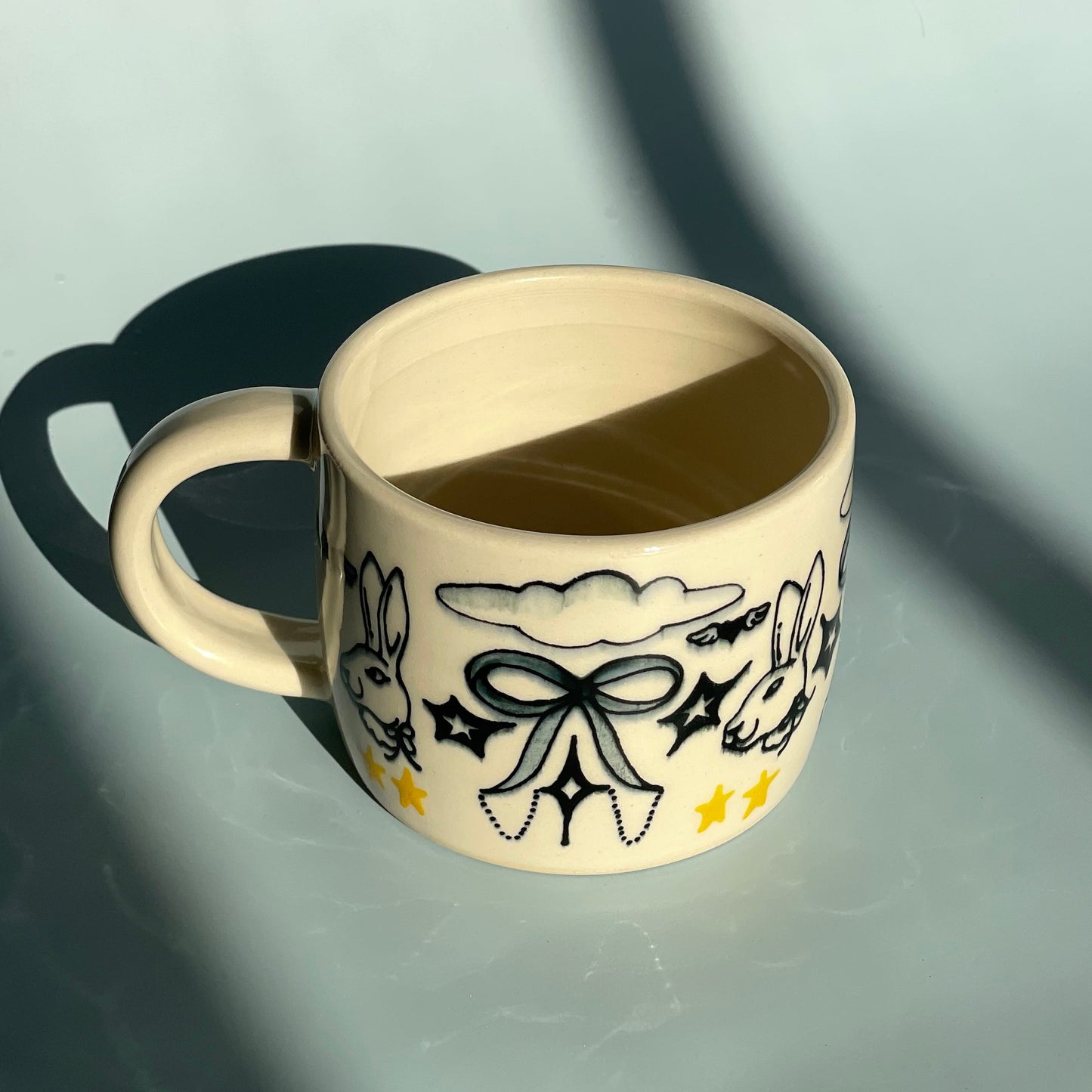 all-knowing bunny mug
